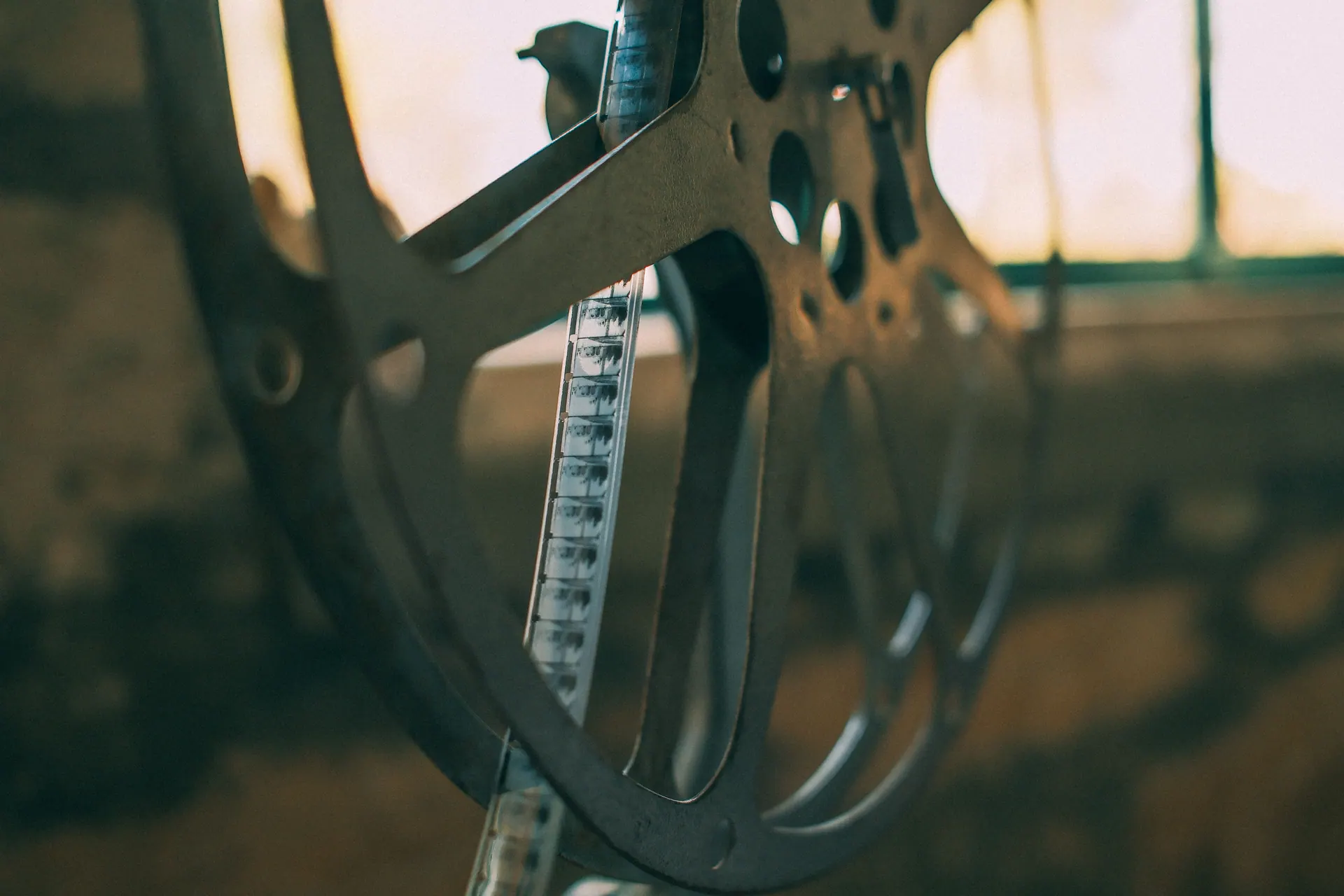 A film maker's hands on a camera